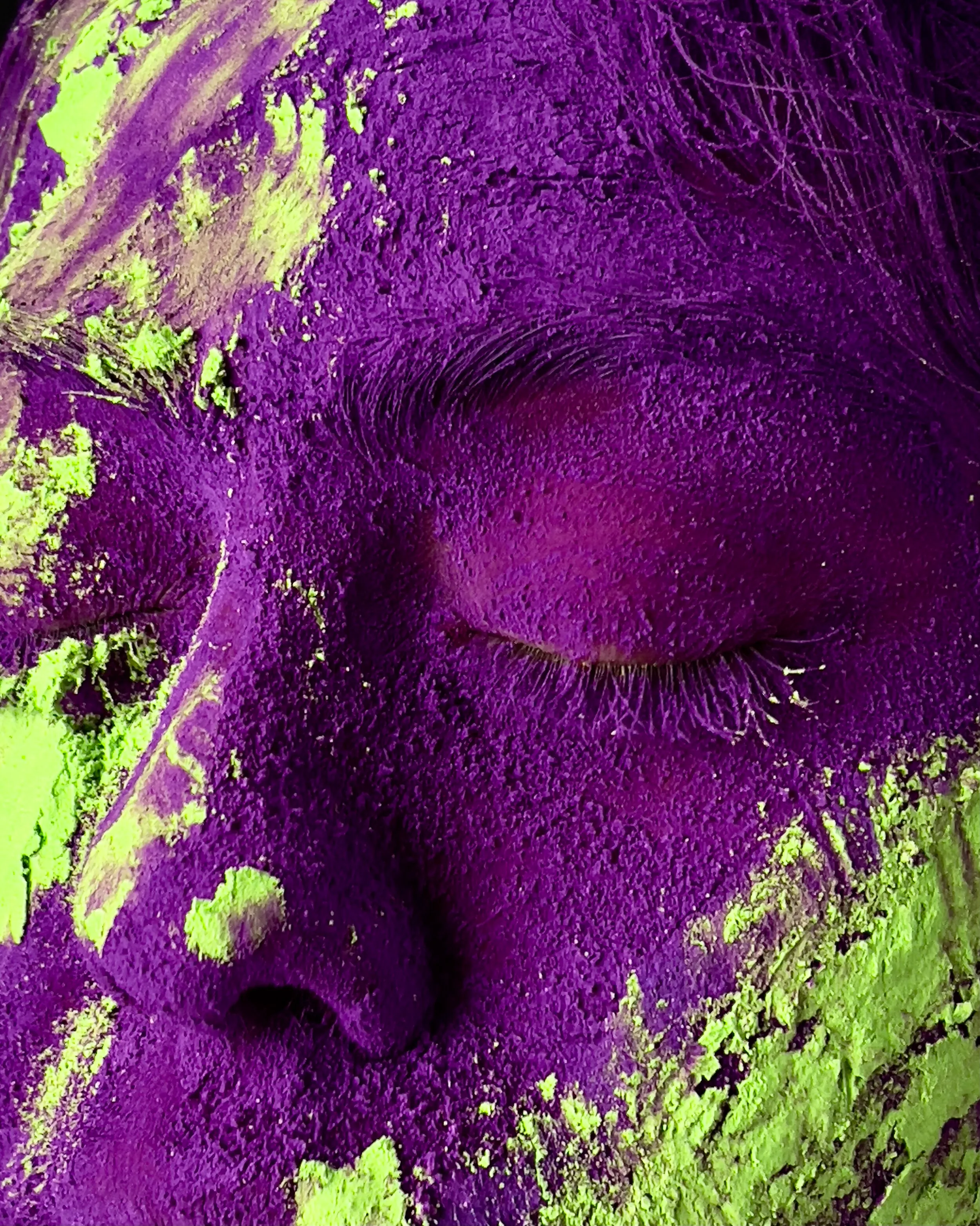 @apple Holi carousel, image six — hands and colour in motion