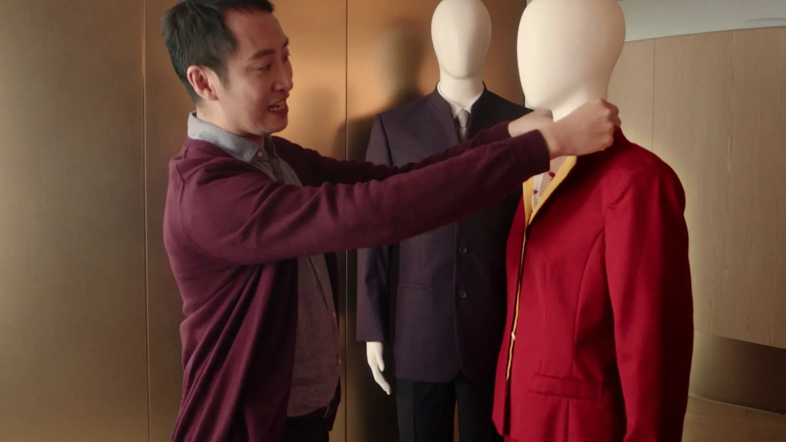 Tailored to Fly film still — Cathay Pacific crew in service moment