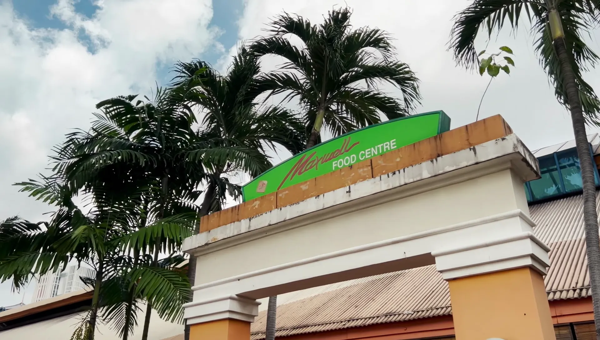 Poached documentary still — Maxwell Food Centre chicken rice stall scene