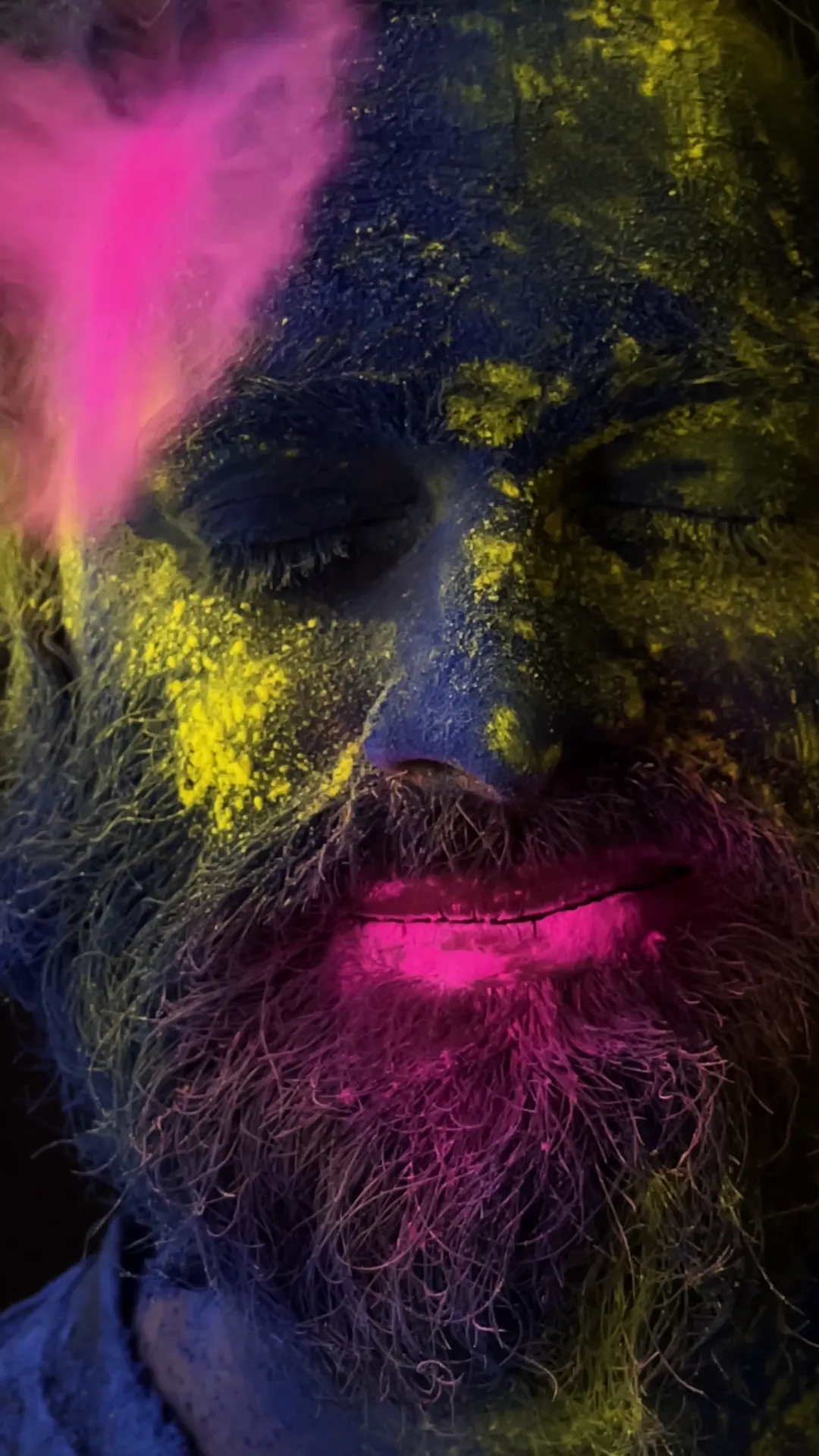 Holi story frame shot on iPhone 12 Pro Max — celebrants covered in colour